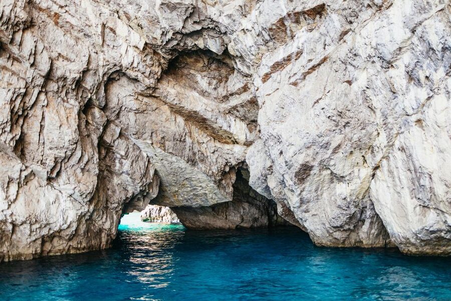 Capri: Island Boat Trip with Grottos - Punta Carena Lighthouse and the Baths of Tiberius: the history you can spot