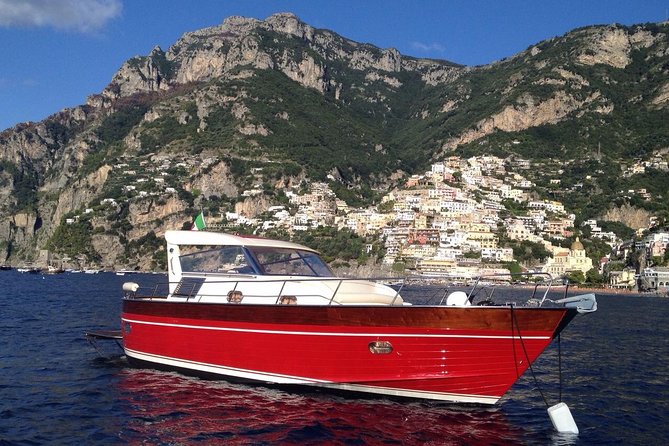 Capri Private Boat Tour from Positano, Praiano or Amalfi - Cruising Capri’s coastline and I Faraglioni from the water