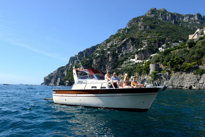 Capri Private Boat Tour from Sorrento, Positano or Amalfi - Faraglioni and Marina Piccola: the postcard moment, minus the crowds