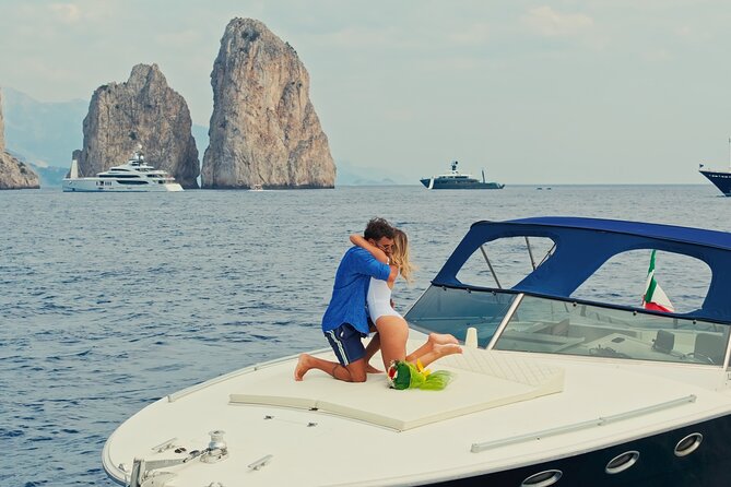 Capri Private luxury Boat Tour - Natural Arch and Faraglioni: cliff art and Marina Piccola views