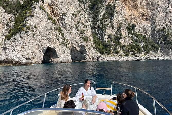 Capri Secret Corners Semi-Private Boat Tour with Local Captain - Marina Grande and Bagni di Tiberio: sand, cliffs, and Roman bathing vibes