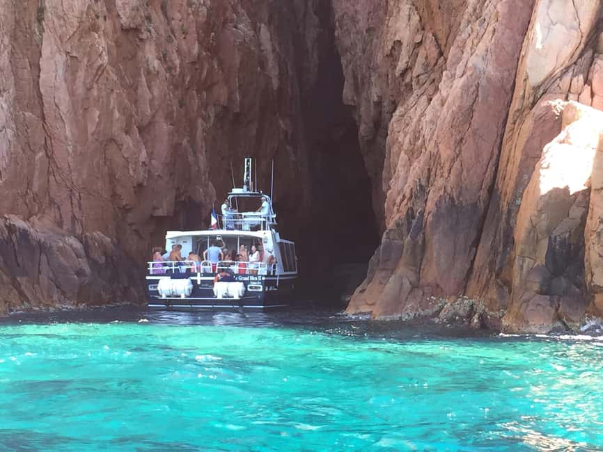 Cargèse: Scandola, Girolata, and Piana Afternoon Boat Tour - Calanques de Piana at golden hour: red rock does the talking