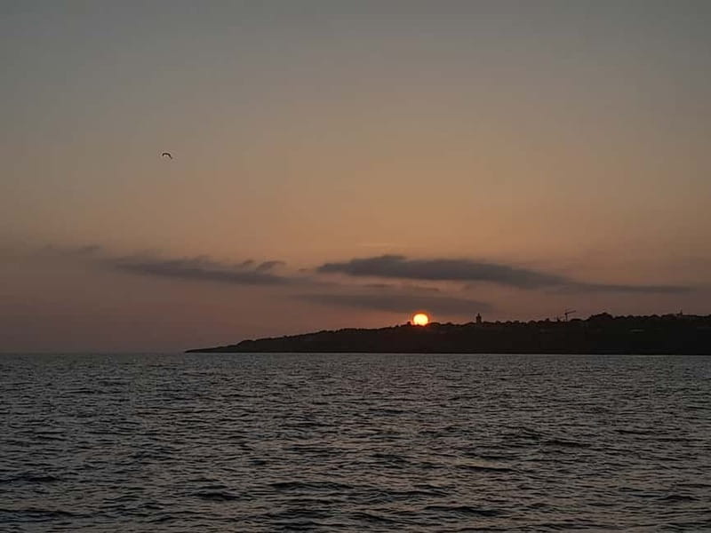 Cascais: Sunset Boat Trip with Welcome Drinks - Boca do Inferno: where the cliffs do the talking