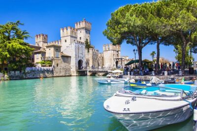 Castles boat tour with Bardolino wine tasting and nibbles - Castle sightings: Sirmione area moments to Lazise’s Scaligero drawbridge