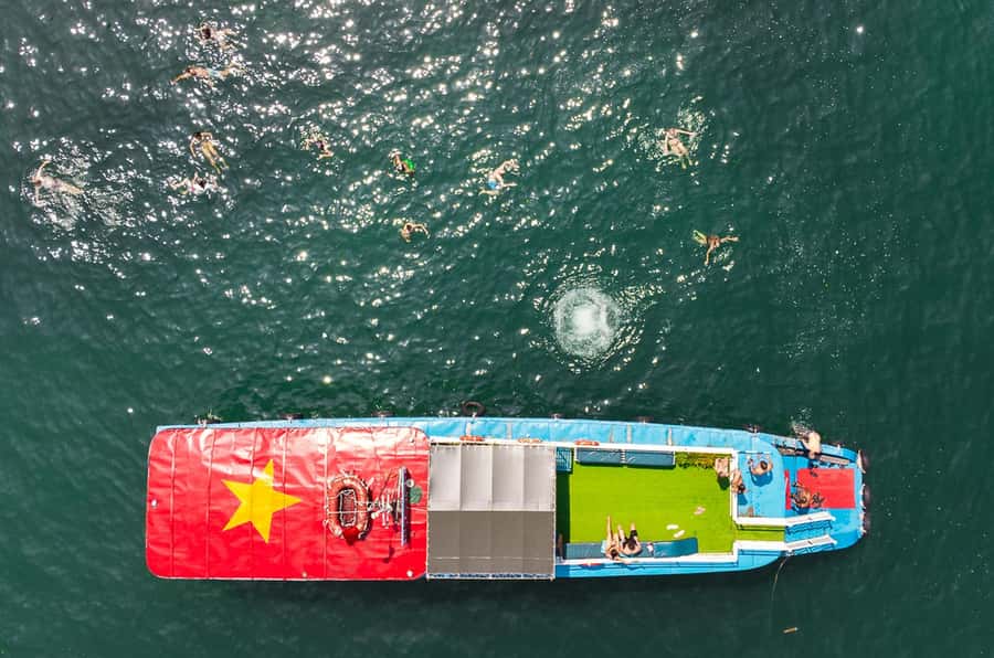 Cat Ba: Lan Ha & Ha Long Bay Kayak & Snorkel Boat Tour - Kayaking in Lan Ha: Caves, Limestone Arches, and Hidden Passages