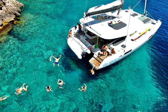 Catamaran Alghero, Catamaran Sailing Day Trip - Captain Max and the Hosting Style That Makes It Work