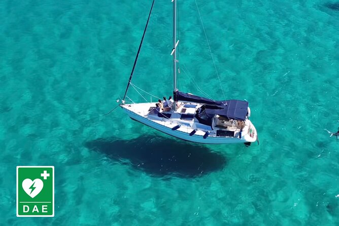 Catamaran tour stops bathing and snorkeling toast with prosecco - Grotta dei Colombi: Limestone Ravine Meets Legend