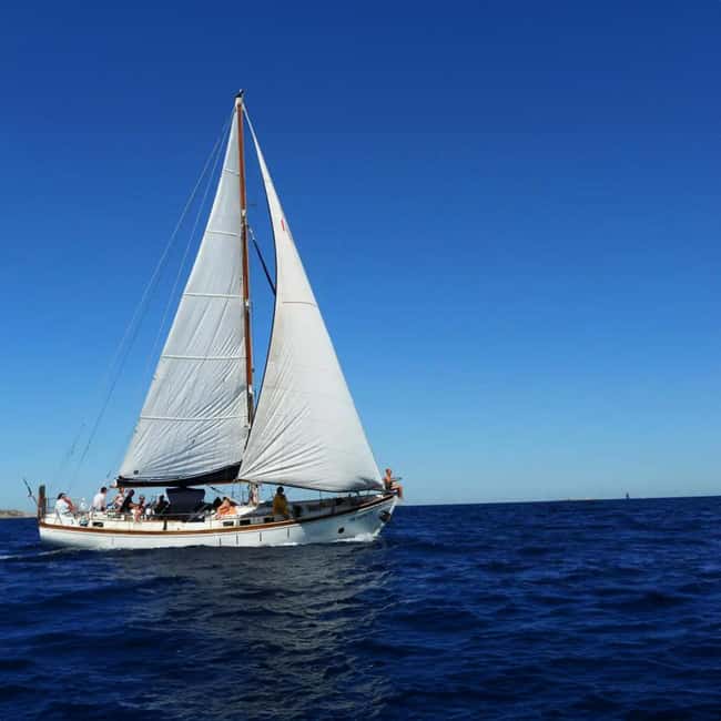Catania: Boat Trip with Aperitif, Prosecco and Snorkeling - Ognina sailing and guided tour: quick culture with a coastal view