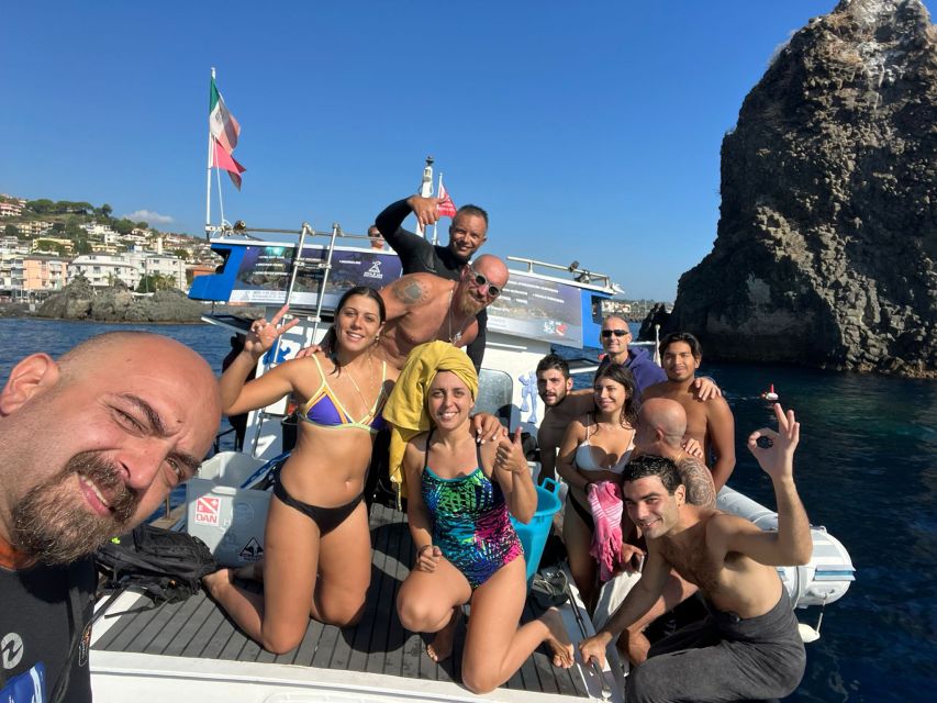 Catania: Cyclops Islands & Timpa Nature Reserve Boat Tour - Getting to Aci Castello and settling in on a 13-meter boat