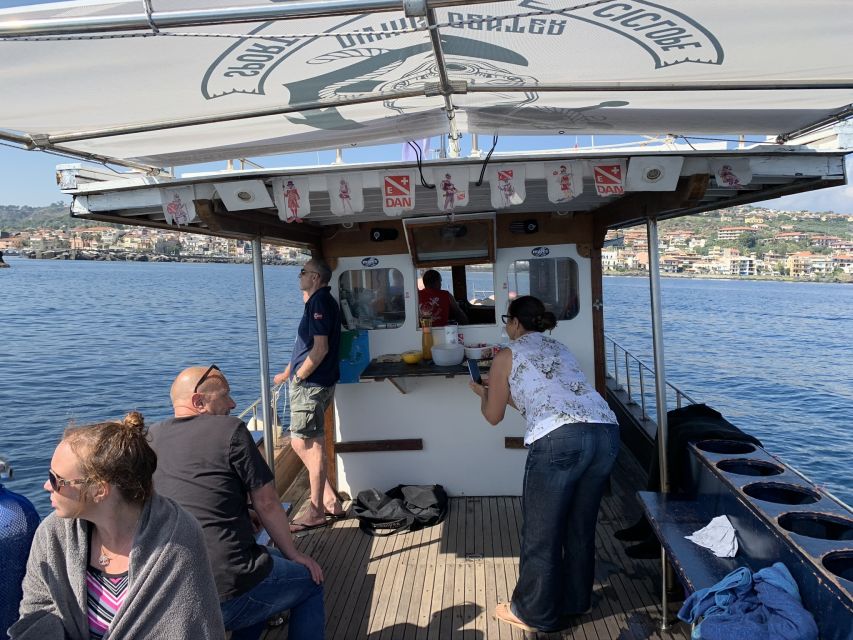Catania: Cyclops Islands & Timpa Nature Reserve Boat Tour - Isola dei Ciclopi under your mask: lava shapes and real marine life