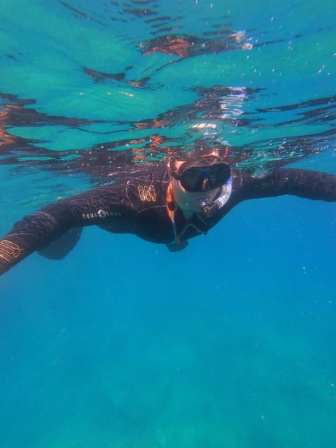 Chania: Boat Trip with Guided Snorkeling Tour - The between-snorkels reset: snack, water, and a breather