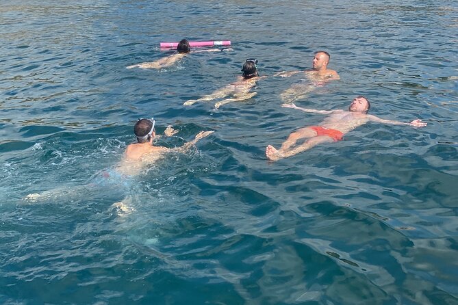 Chiara boat tour in dinghy, stops, snorkeling, aperitif included - Calamosca Beach: Swim Time You Can Actually Enjoy