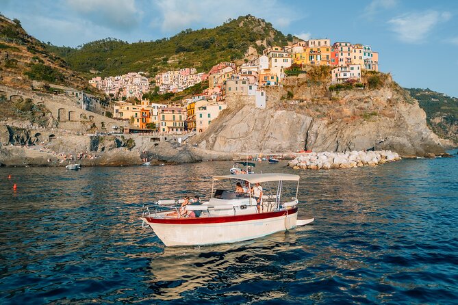 Cinque Terre Sunset Boat Tour : golden hour on the water - Monterosso, Vernazza, and the sea-level village viewing advantage