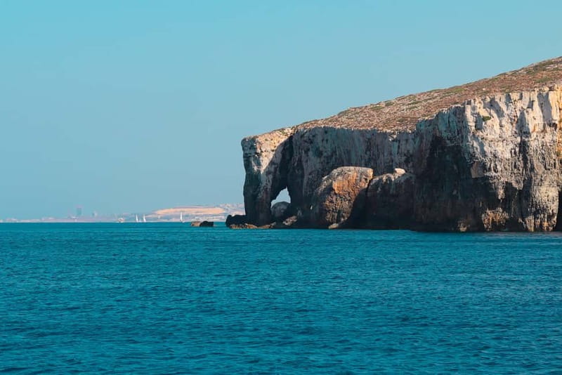 Comino: Blue Lagoon, Crystal Lagoon and Sea Caves Boat Tour - Santa Maria Bay and the Comino Caves Experience