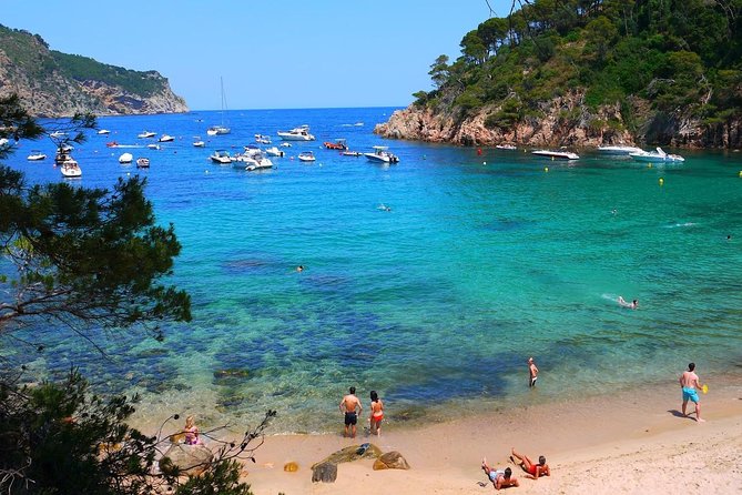 Costa Brava Small Group with Hotel Pick up and Boat Ride - Sant Feliu de Guíxols: Scenic Road Stops, a Chosen Beach, and Old-Fishing-Village Streets