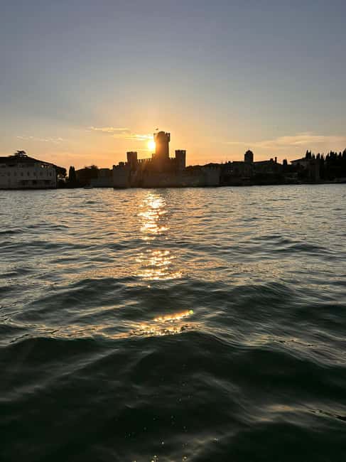 Desenzano del Garda: Sunset Boat Trip at Sunset with Drink - Prosecco toast and music: how the onboard vibe supports the scenery