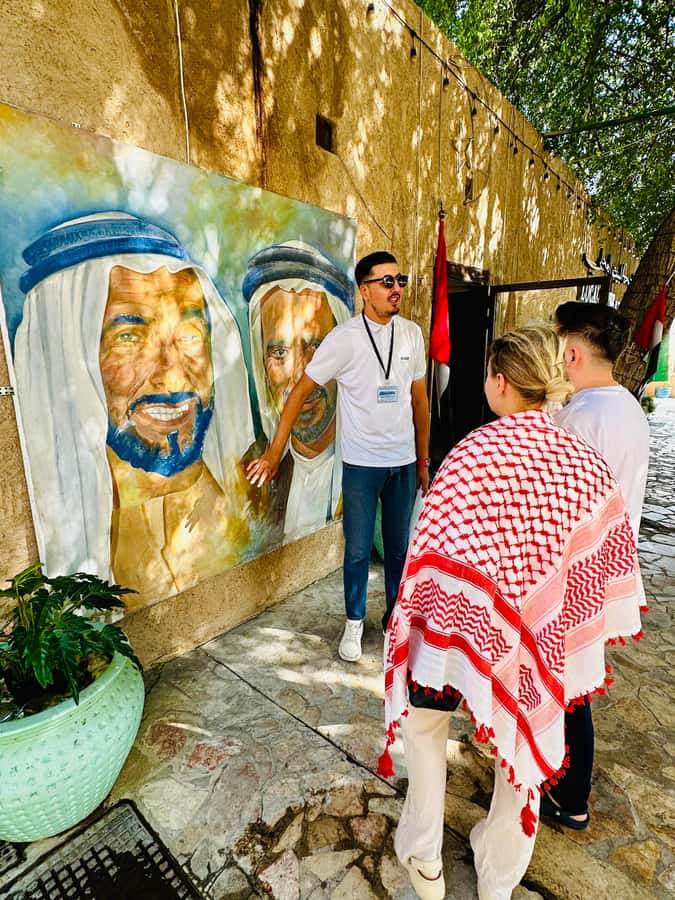 Dubai: Authentic Old Town, Souks, Tastings & Abra Boat Tour - Entering Old Dubai at the Arabian Tea House meeting point