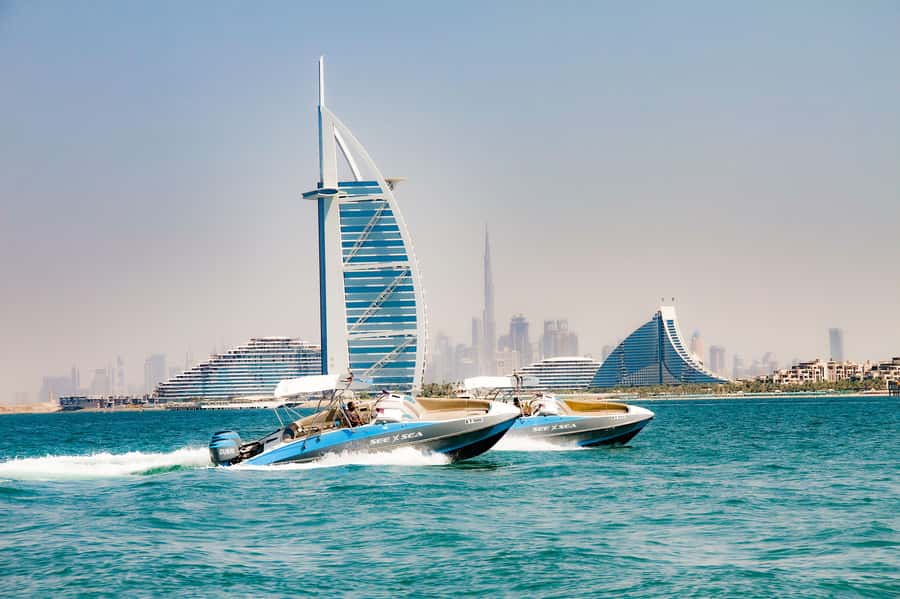 Dubai: Marina Private Boat Tour & Palm Jumeirah Sightseeing - On-Board Experience: Guided Commentary, Music, and Photo Stops