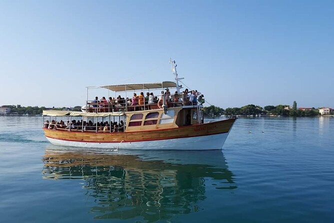 Dubrovnik Islands Boat Tour with Lunch and Unlimited Drinks - Stop 1: Koločep island time for shade, churches, and pebble swims