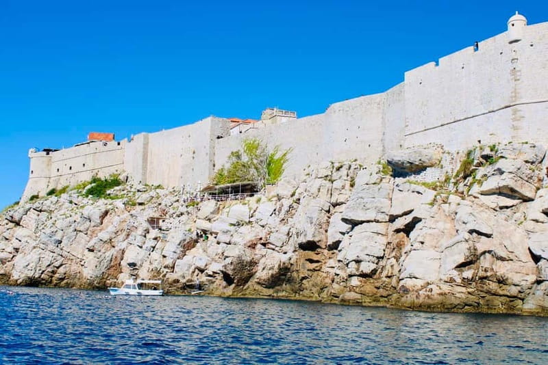 Dubrovnik or Cavtat: Lokrum Island and Betina Cave Boat Tour - St. Jacob Beach: the calm-water swim stop with Dubrovnik in view