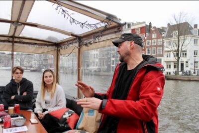 Dutch Cheese & Drinks Guided Amsterdam Boat Tour, All Inclusive - Oude Kerk (1306) and the Surprise of a Church in the Red Light District
