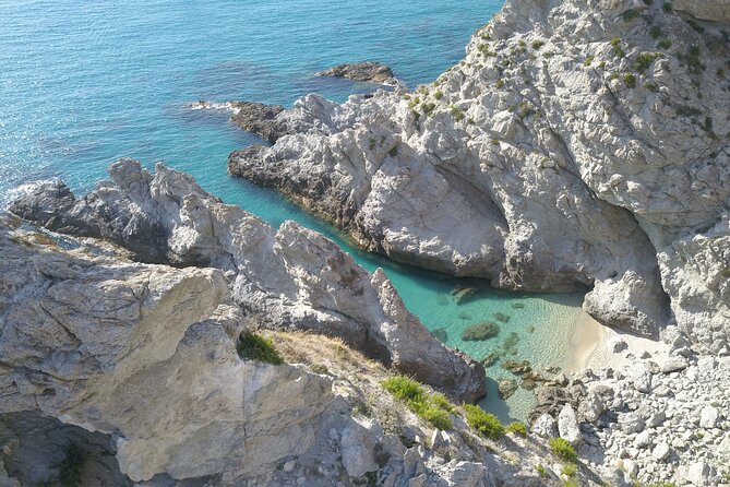 Exclusive boat tour for up to 8 people, beautiful Tropea - Praia di Fuoco and Grotticelle Beach: golden sand meets fish-filled water