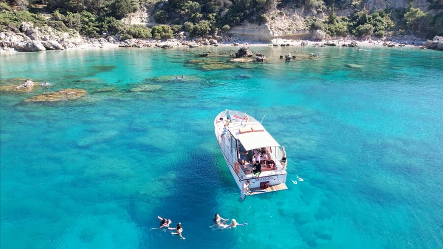Faliraki: Boat Trip to Afantou Caves, Antony Quinn, Ladiko - Food and Drinks: Wine, Fruit, and Cocktails for Extra Charge