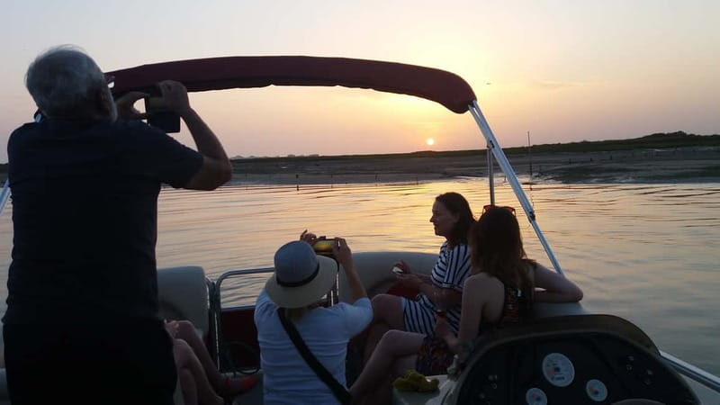 Faro: Sunset 1 hour Ria Formosa Boat Tour - Comfort on board: small catamaran feel and real-world tips