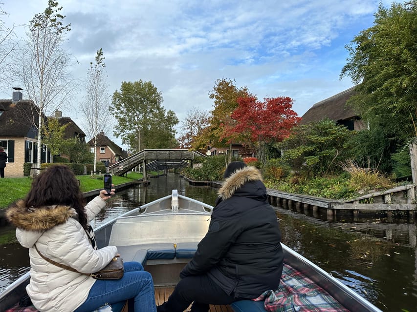 From Amsterdam: Giethoorn Small Group Tour with Boat Ride - Walking the Village Center: Bridges, Photos, and Time to Roam