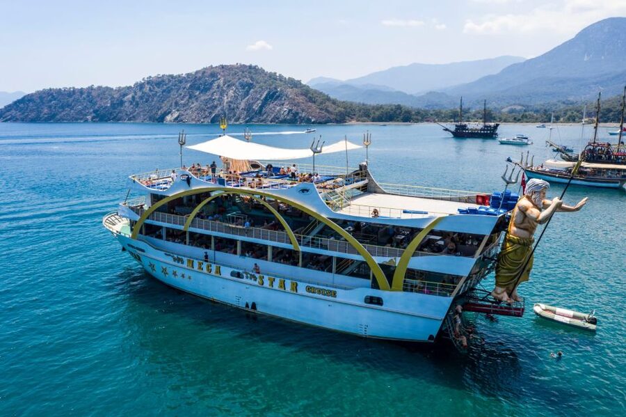 From Antalya: Full-Day Boat Tour with Lunch and Foam Party - The first cruising stretch: Kemer marinas and sheltered pebbled bays