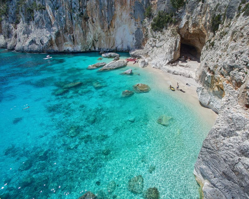 From Arbatax: Full-Day Guided Boat Tour of the Baunei Coast - Cala Mariolu stop: swim, snorkel, photos, and the first wow-factor