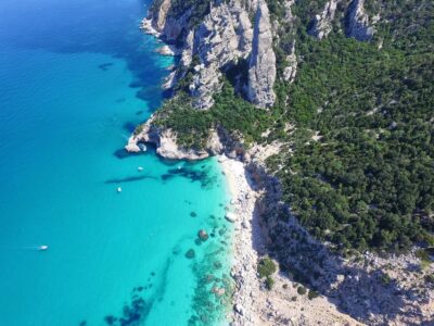 From Arbatax: Full-Day Guided Boat Tour of the Baunei Coast - The boat, the route, and the Sardinia Natural Park views while you cruise