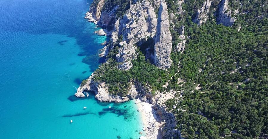 From Arbatax: Full-Day Guided Boat Tour of the Baunei Coast - Cala Luna: cliff views plus real water time for snorkelers