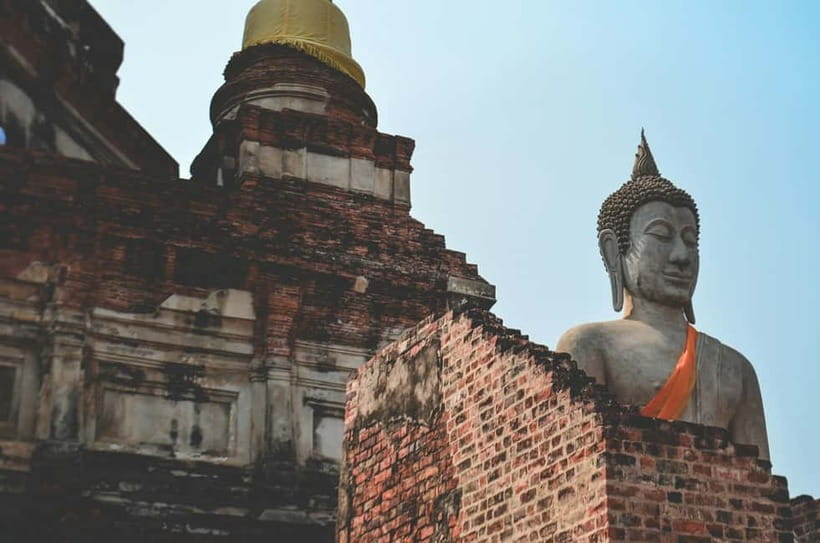 From Bangkok: Ayutthaya Heritage Tour with Sunset Boat Ride - Wat Maha That: The Buddha Head in Tree Roots (Bring Your Brain, Not Just Your Camera)