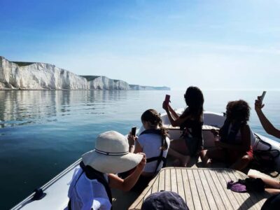 From Brighton: Seven Sisters Boat Tour - Smuggling Stories and Local Legends: Why the Guide Matters