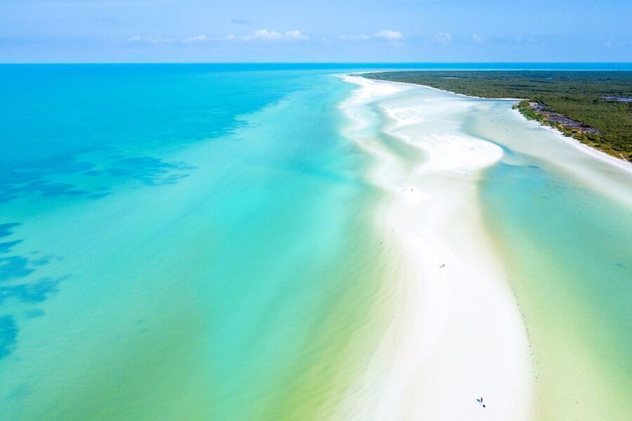From Cancun or Puerto Morelos: Holbox Boat Tour with Lunch - Getting There From Cancun or Puerto Morelos: Van, Boat, and Skipping the Lines