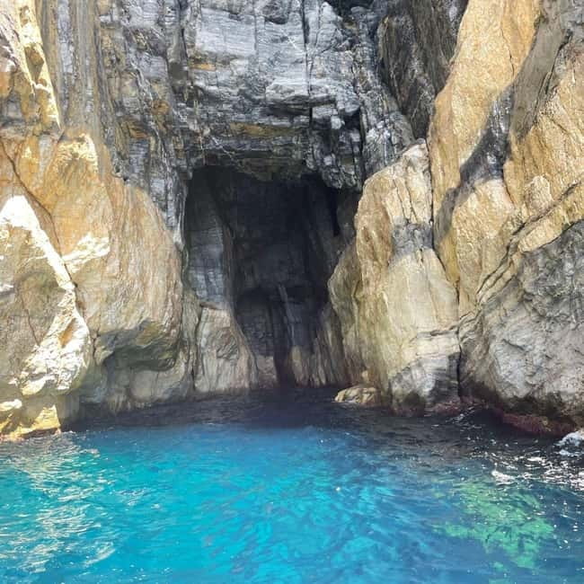 From Fezzano: Portovenere & Gulf of Poets Half-Day Boat Tour - Fezzano start: finding the boat under the yellow crane