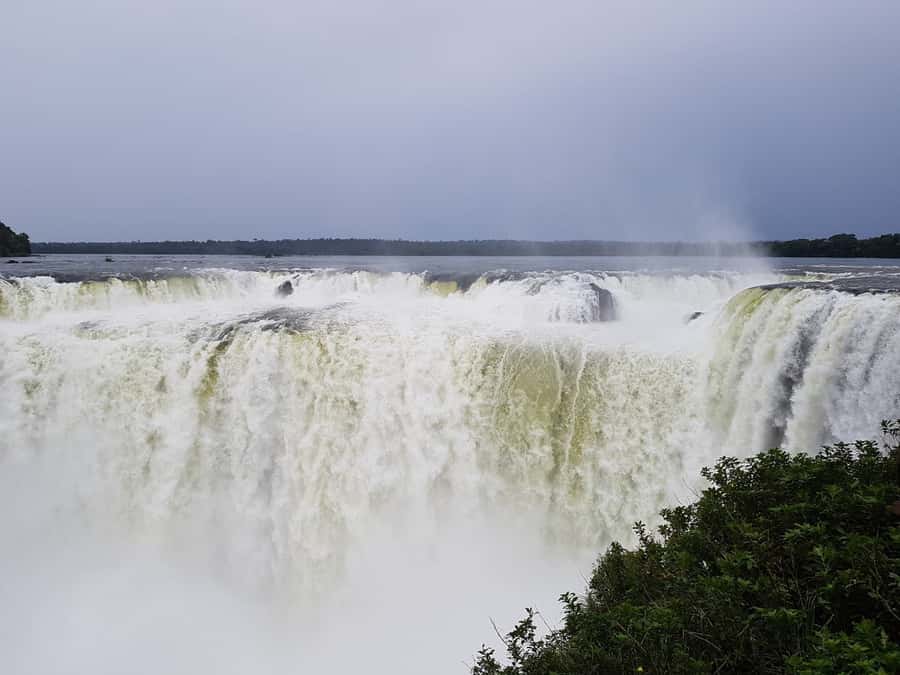 From Foz do Iguaçu: Iguazú Falls Boat Ride Argentina - Iguazú Forest to Boat Day: Jungle Walking and the Three Musketeers Shower