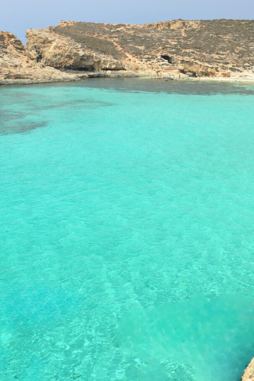 From Malta/Gozo: Comino & Crystal Lagoon Private Boat Trip - Crystal Lagoon Swim Stop: Clear Water and Snorkel Gear Included