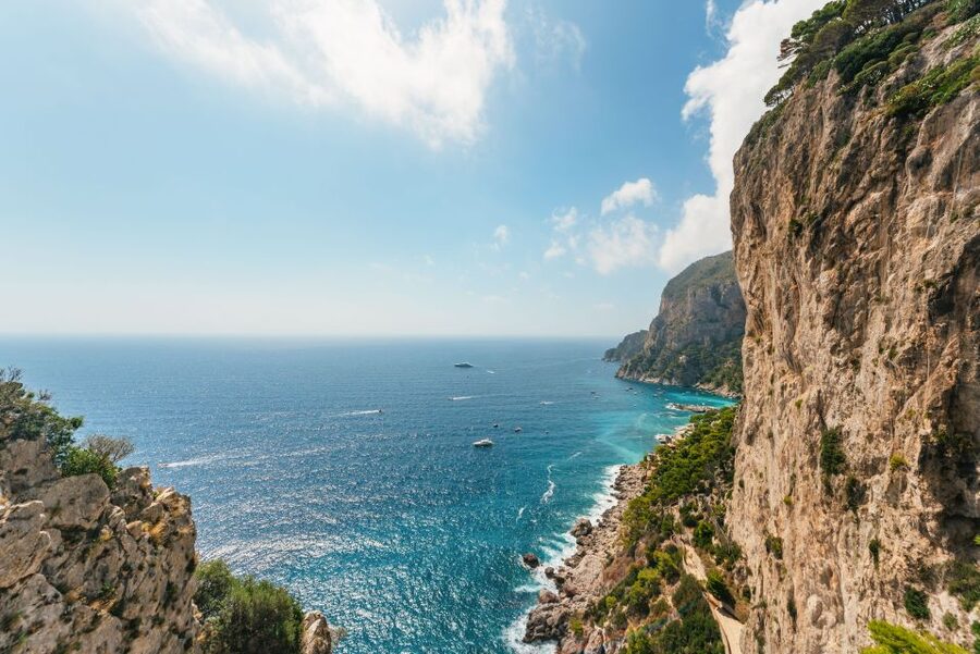 From Naples: Gulf of Naples & Capri Sightseeing Boat Tour - On Capri’s boat loop: sea caves, Natural Arch, and famous villas from the water