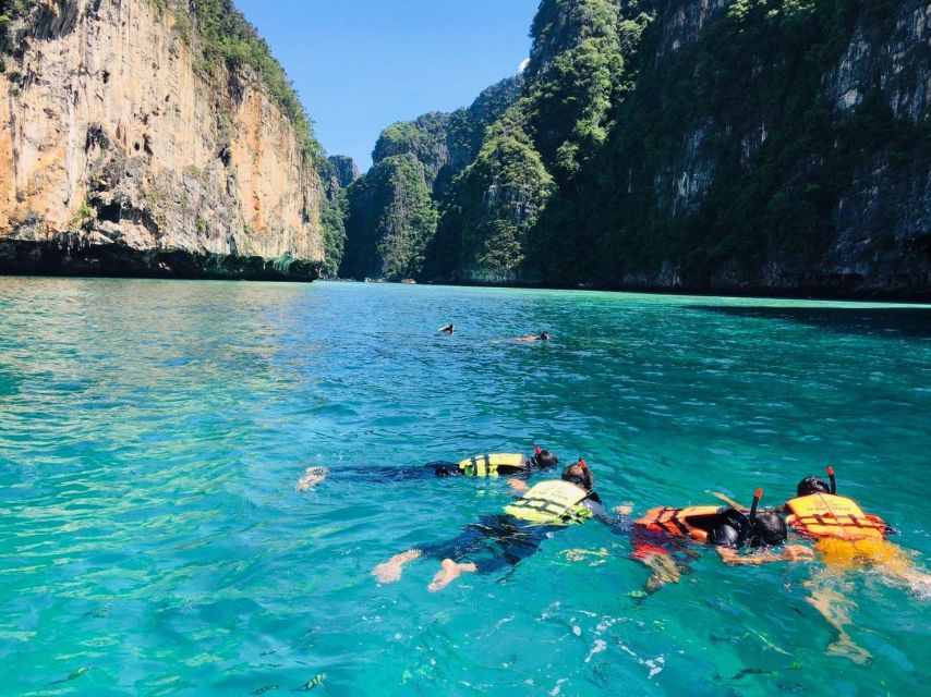 From Phi Phi: Half-Day Longtail Boat Tour with Snorkeling - Monkey Beach: wild monkeys, good photos, and how not to annoy them