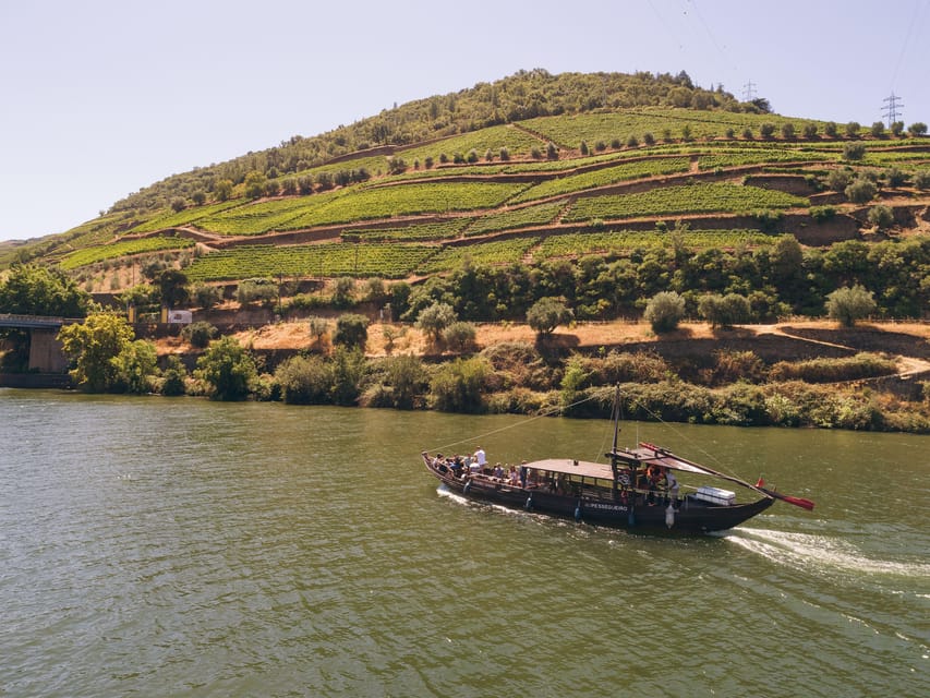 From Pinhão: Douro Valley Rabelo Boat Tour with Port Wine - Approaching the Tua area: Foz Tua Dam and nature-meets-industry