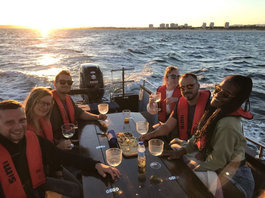 From Portimão: Sunset Boat Trip with Wine - Wine, water, and snacks: how the onboard part works