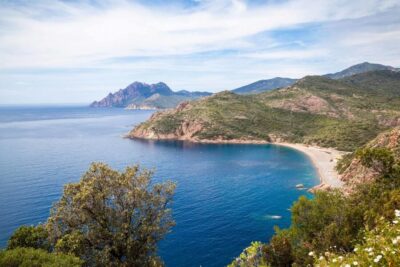 From Porto: Boat tour to the Calanches of Piana & Capo Rosso - Calanques de Piana: pink granite cliffs up close, with caves and fissures