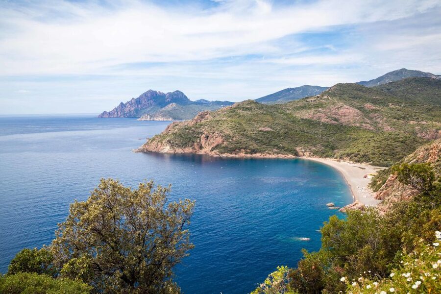 From Porto: Boat tour to the Calanches of Piana & Capo Rosso - Calanques de Piana: pink granite cliffs up close, with caves and fissures