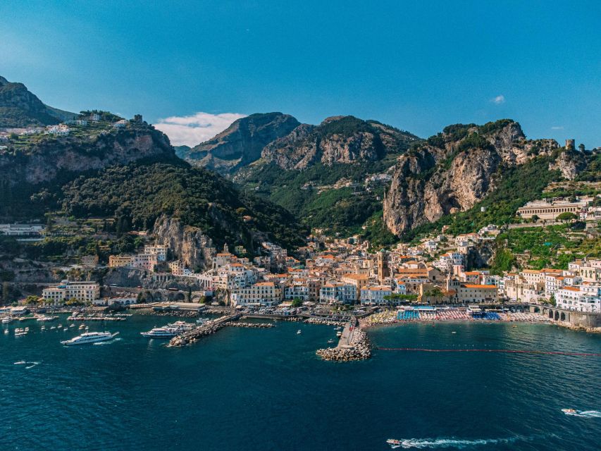 From Positano: Amalfi Coast Boat Tour with Swimming Stop - Amalfi for 1.5 hours: do you want shops, views, or both?