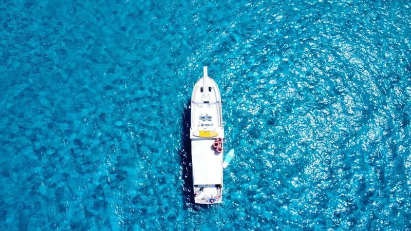 From San Antonio: Family Boat Tour to Conillera Island - Snorkeling at Sa Conillera: marine life, managed for real families