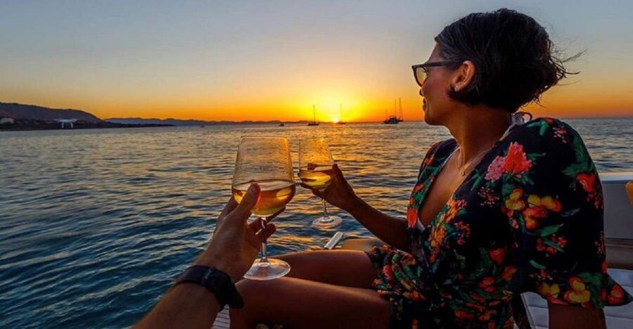 From Sorrento: Capri Boat Tour Day & Night Experience - Capri by boat circuit: grottos, cliffs, and postcard passes