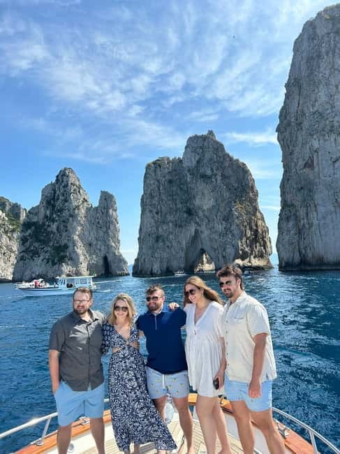 From Sorrento: Full-Day Boat Tour to Capri with Drinks - Capri close-up by boat: grottos, Faraglioni, and the rock icons
