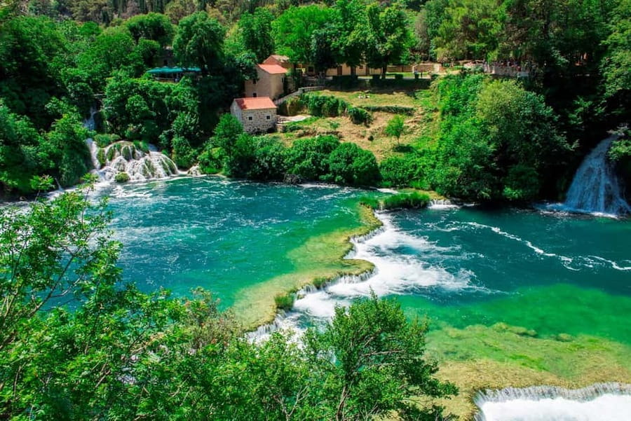 From Split: Krka Waterfalls Tour with Boat Ride & Swimming - Guides in action: history stories with humor, not a lecture